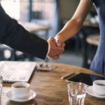 Discussion of partnership in cafe