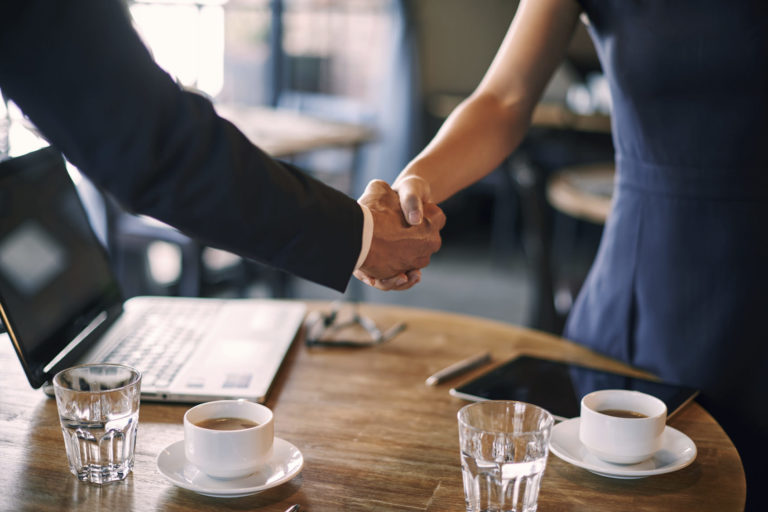Discussion of partnership in cafe